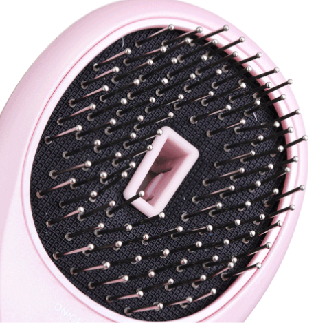Le Peigne De Massage